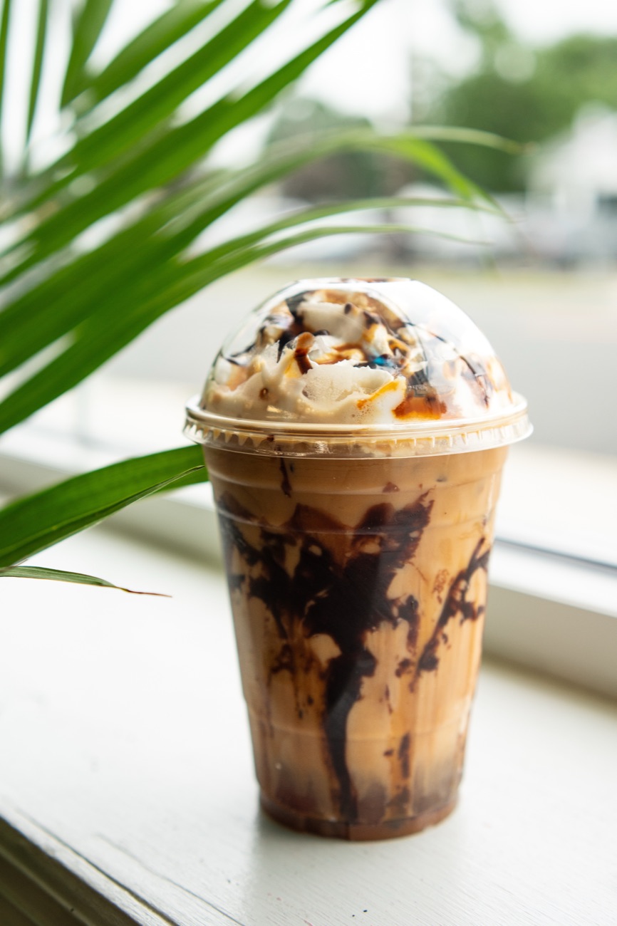 Mocha frappe with whipped cream and chocolate drizzle