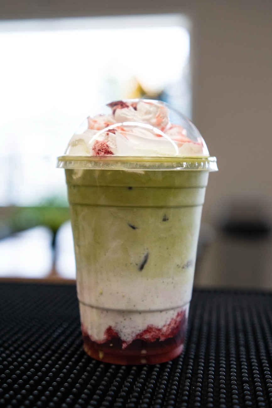Iced strawberry matcha layered with cream